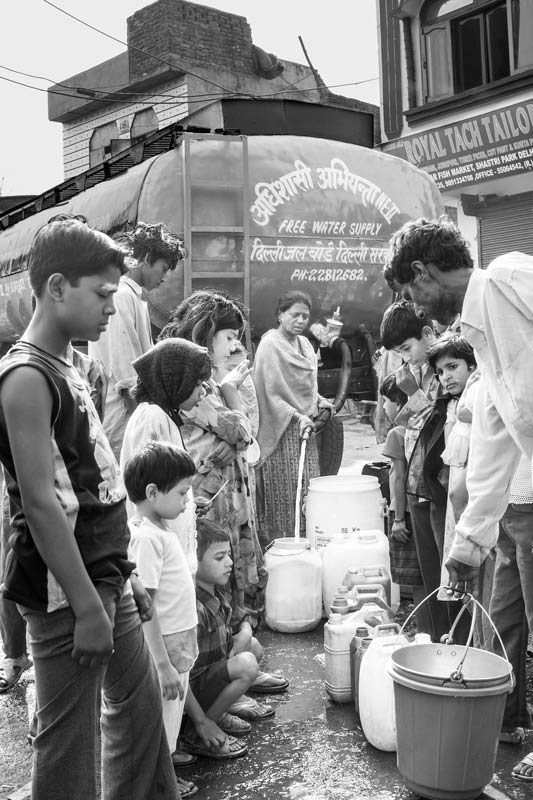 Queue and Rush for Drinking Water at a water tanker in North-East district, National Capital Territory of Delhi